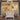 Elegant Cranes Flying Over Abstract Golden Canvas with Textured Patterns